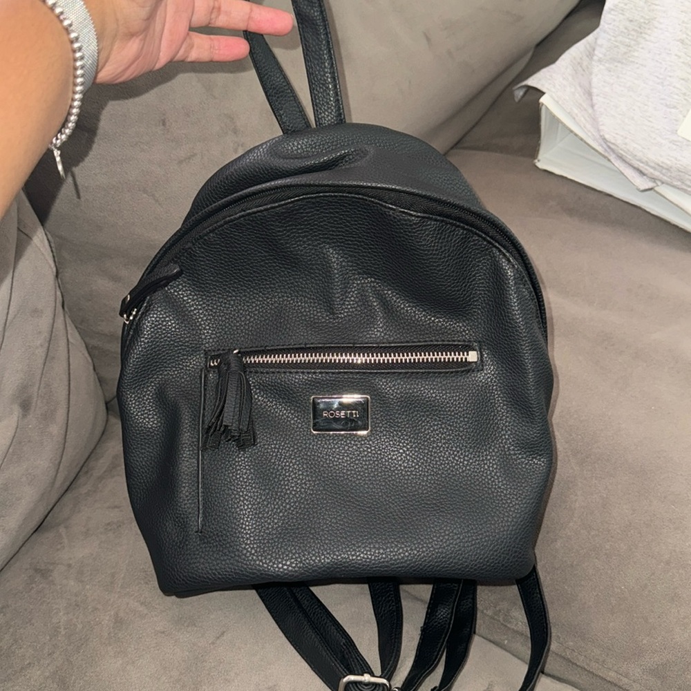 Small black leather backpack. Great condition